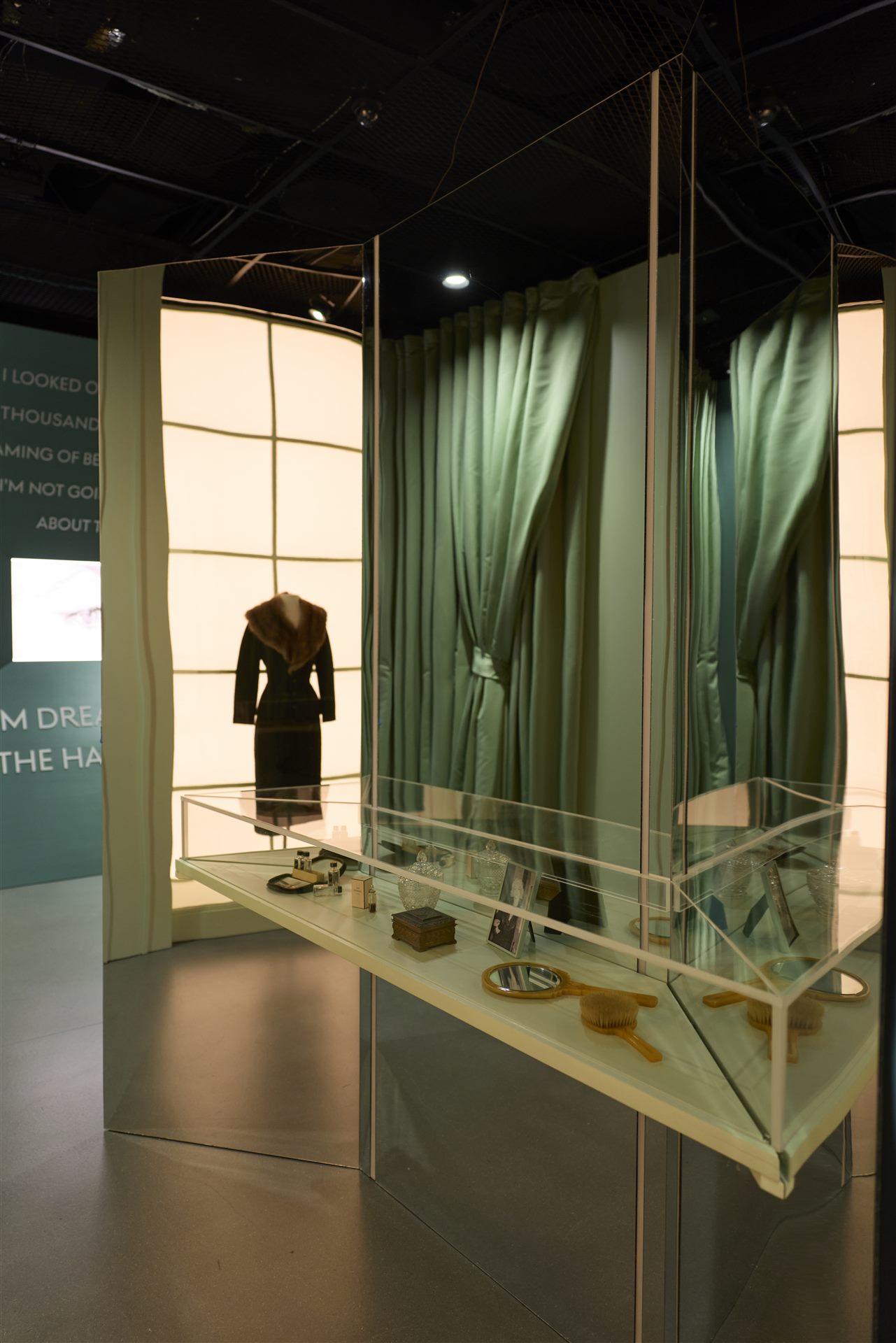 An archival garment and personal objects from The Marilyn Monroe Collection displayed in the Vanity room