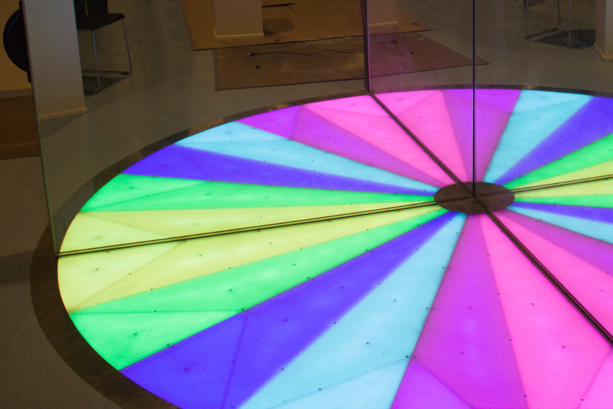 Mirrored, color-lit floor installation for the Open Book exhibit